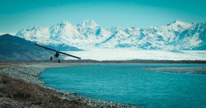 SQ-12 inbound hot, set against the insanely-blue water of the Knik glacial outflow.