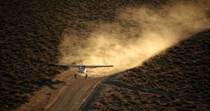A Cessna Skywagon finds a likely landing zone in the high desert of Nevada.
