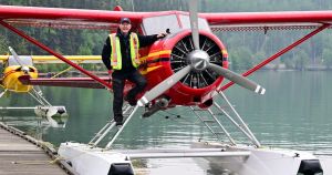 A highly visible combo: photographer Simon Blakesley, in day-glo and ready to chase Yukon light  in the Beaver.