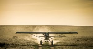 A Super Cub in the rollout phase of landing