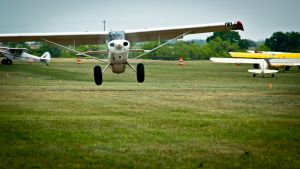 An Aviat Husky approaches the threshold of the Llano STOL competition
